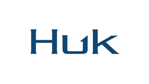 The iconic blue Huk logo, signifying durable, performance-driven footwear for outdoor and fishing adventures.