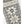 Hestra grey and white wool knit mitten with snowflake pattern and brand logo patch