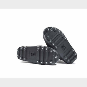 Impacto black rubber ice cleats with metal studs on the soles