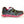 Mammut traction spikes attached to a black and pink running shoe