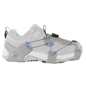 Korkers grey traction device attached to a white shoe