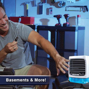 Man using an Ontel Arctic Air portable cooler in a workshop