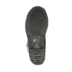 Black rubber lug sole of a Kamik winter boot