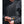 Person wearing 221B Tactical black mesh cooling vest over a black shirt