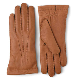 Hestra tan leather gloves with decorative stitching on the back