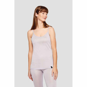 Woman wearing a light purple spaghetti strap camisole with lace trim
