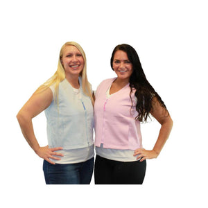 Two women wearing Polar Products cooling vests in light blue and pink