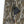 Mobile Warming battery pack inside a zippered pocket on Mossy Oak Bottomland camouflage fabric