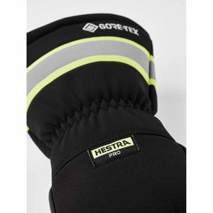 Hestra black glove cuff with Gore-Tex logo and yellow reflective stripes