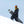 Snowboarder wearing Smith Optics goggles and winter gear standing on a snowy slope