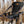 Chaheati Max tree stand seat with camo frame and black headrest mounted to a tree in a winter forest