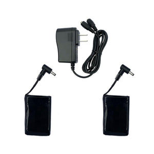 Dual battery charger with two black battery packs and a power adapter