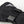 Black Hestra glove cuff with adjustable strap and brand logo patch