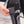 Hand adjusting power button on 509 heated sock