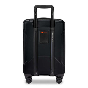 Back view of a black Briggs and Riley carry on suitcase with an extended handle and four spinner wheels
