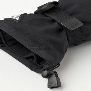 Black Hestra glove cuff with adjustable strap and drawstring toggle