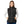 Woman wearing a black Venture Heat softshell vest over a grey long sleeve shirt