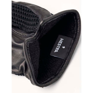 Hestra black leather glove interior showing size 9 label