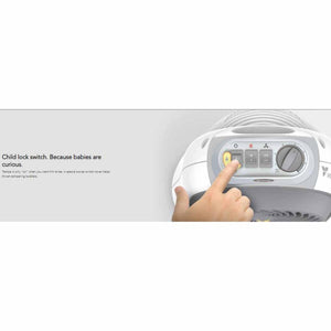Vornado heater control panel with a finger pressing the child lock switch cover