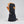 Black and tan leather ski glove with adjustable wrist strap and cuff