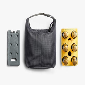 Black grid pattern cooler bag with ice pack and six pack of Stone and Wood beer