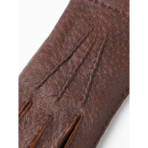 Brown Hestra leather glove with decorative stitching on the back