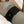 Person wearing a black MiHigh waist wrap over sage green activewear