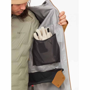 Interior view of Marmot jacket showing mesh pocket with gloves and powder skirt