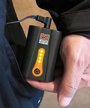Mobile Warming battery pack with power indicator lights held in a hand