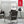 Vornado pedestal fan in a living room with a 5 year satisfaction guarantee graphic