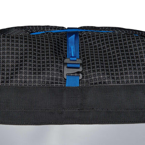 Black Diamond backpack detail featuring black grid fabric with blue strap and black plastic buckle