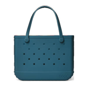 Teal Bogg Bag tote with perforated design and two handles
