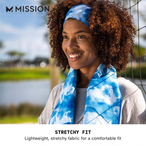 Woman wearing a Mission blue cloud print cooling headband and towel