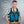 Man wearing an AlphaCool cooling vest with blue gel inserts