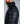 Man wearing a black 8K Tech Apparel puffer jacket with a high collar