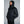 Man wearing a black 8K FlexWarm hooded puffer jacket