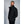 Man wearing a black 8K FlexWarm puffer jacket