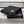 Two black ActionHeat heated seat cushions with Minnesota Vikings and San Francisco 49ers logos on metal bleachers