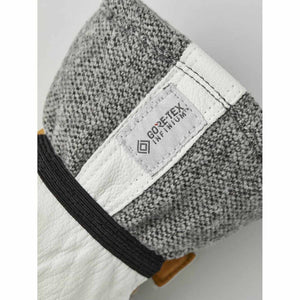 Hestra glove cuff featuring a Gore-Tex Infinium fabric label and white leather trim