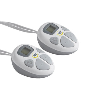 Two Serta branded wired remote controls with digital displays and control buttons
