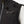Water beads on the black water-resistant fabric of a Venture Heat vest