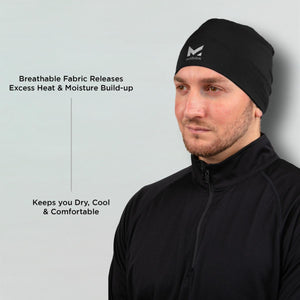 Man wearing a black Mission beanie with text highlighting breathable fabric and moisture management