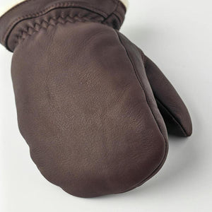 Brown Hestra leather mitten with white lining