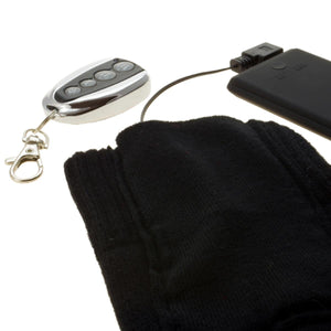 Black fabric accessory with a remote control and a portable power bank connected by a cable