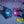 Two children holding Ontel light up plush toys with six colored light settings