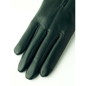 Dark green leather glove on white background