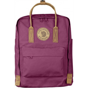 Plum purple Fjallraven Kanken backpack with tan leather handles and trim
