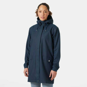 Woman wearing a navy blue Helly Hansen hooded rain jacket