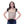Woman wearing a tan tactical vest over a black t-shirt and blue jeans