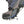 Hiking boot fitted with metal ice traction cleats and chains